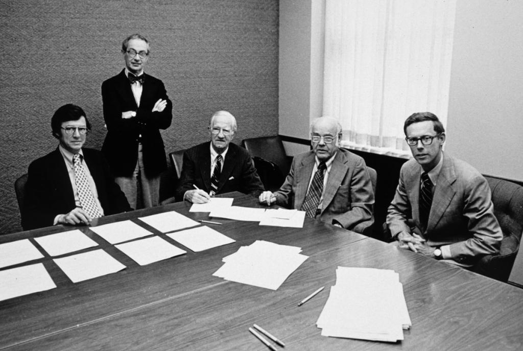 Roger Hale (currently an Honorary Trustee), Martin Friedman (currently Director Emeritus), Justin V. Smith (a Walker family member and former president of the T.B. Walker Foundation), Walter Walker (a Walker family member and the late husband to current board member Elaine), and Tom Crosby, with paperwork making the Walker a truly public institution, 1976. Photo: Walker Art Center Archives