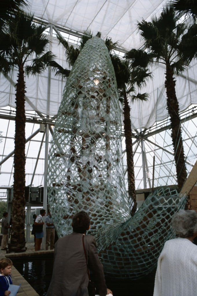Interior of the Cowles Conservatory with a view of Frank Gehry’s Standing Glass Fish, Minneapolis Sculpture Garden Opening, 10 September 1988