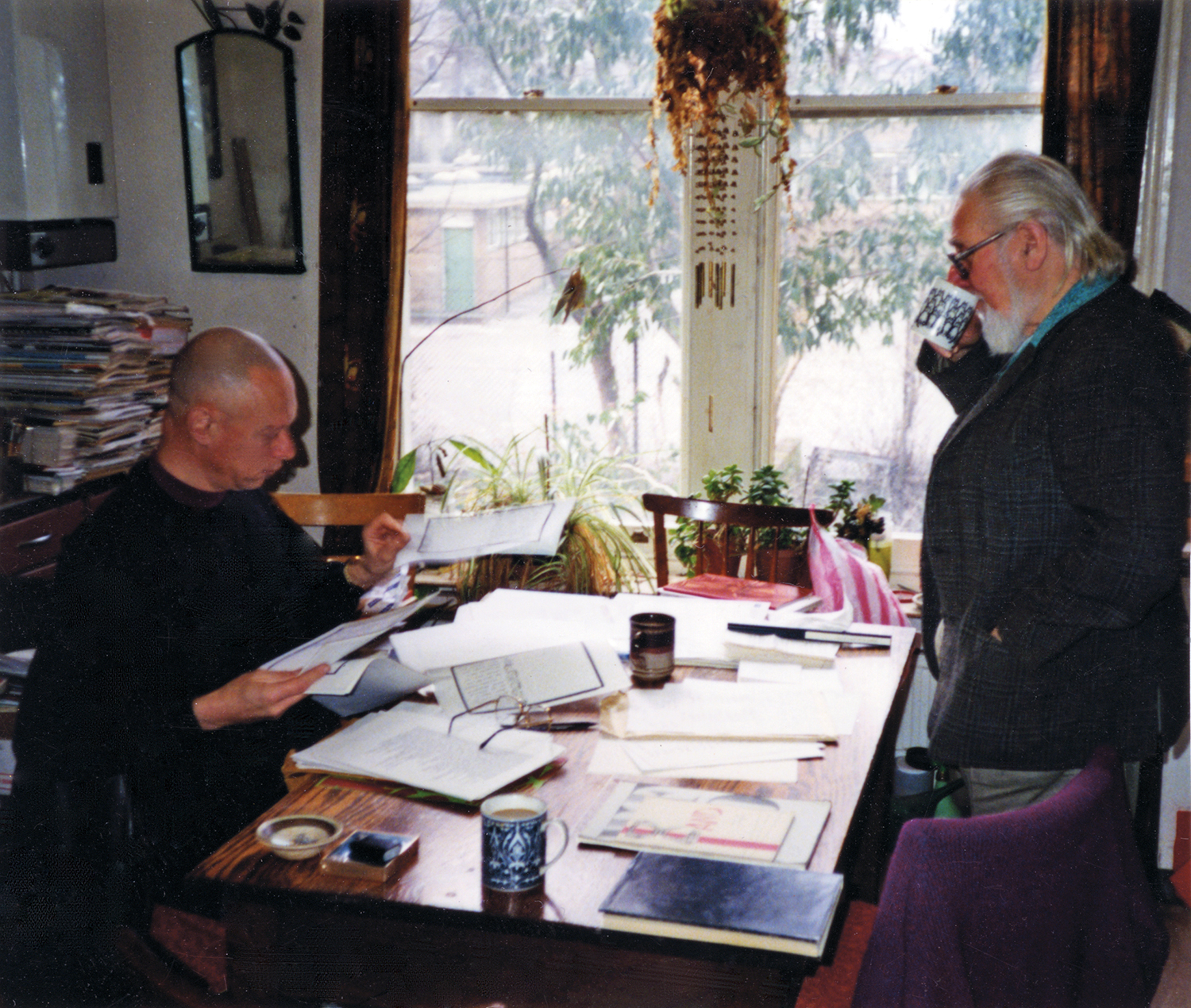 Adrian Clarke and Bob Cobbing in the kitchen of Cobbing and Pike’s home at Petherton Road editing AND 9, 1995. Photographer: Jennifer Pike.